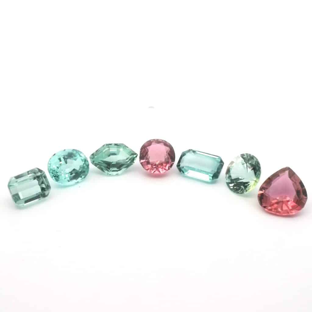 Assorted tourmaline gemstones in green and pink hues